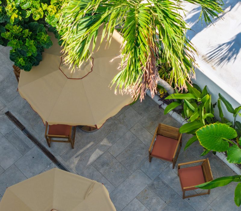 Overhead view of the tropical courtyard patio at Tiana Beach Inn in Hollywood Beach