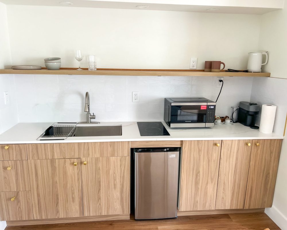 Renovated Deluxe Room with kitchenette and modern furnishings at Tiana Beach Inn Hollywood Beach